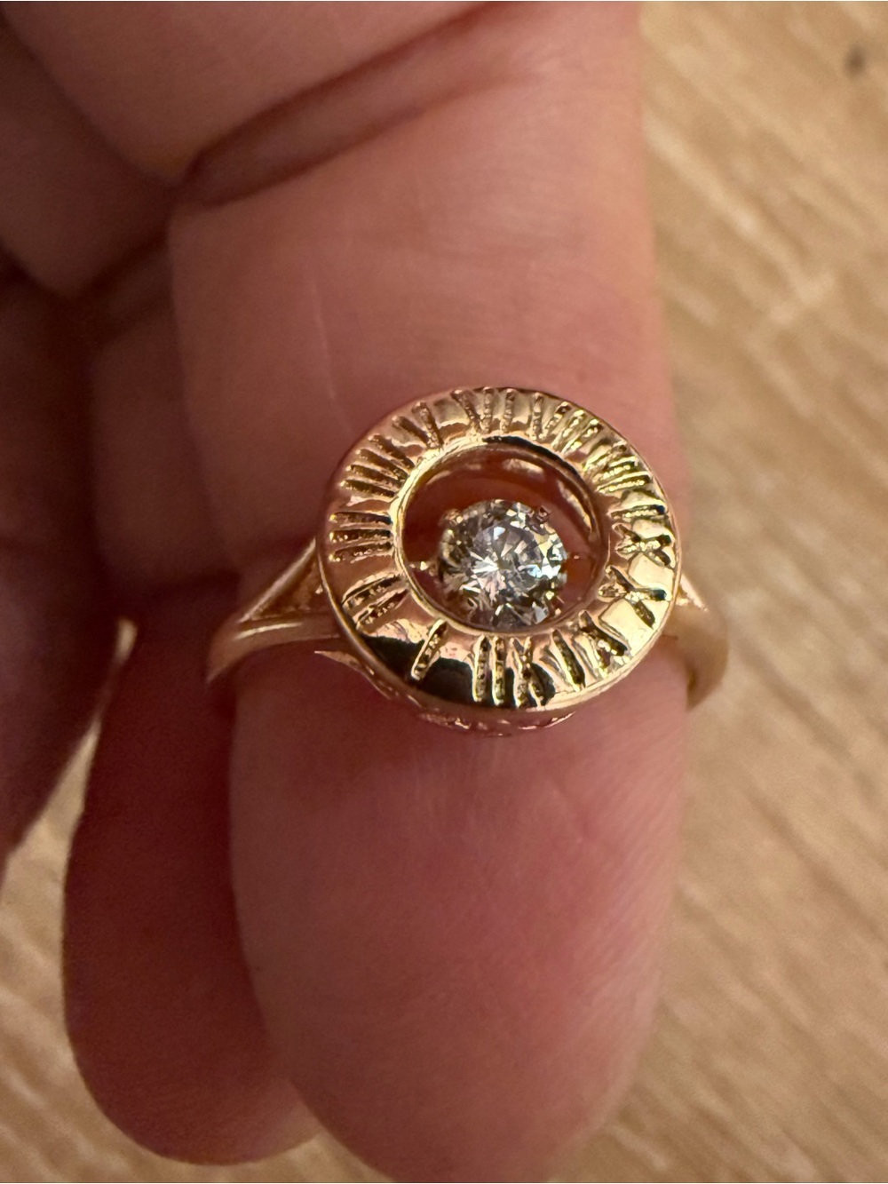 Gold Sunburst Halo Ring with Clear Stone